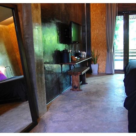 Qi 68 Hotel Chiang Mai Værelse billede