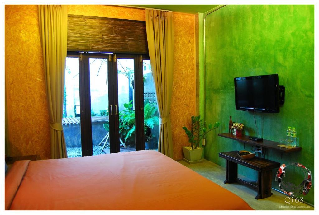 Qi 68 Hotel Chiang Mai Værelse billede